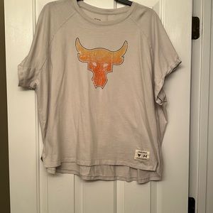 Women’s short sleeve under armour The Rock collection size XL base color is tan